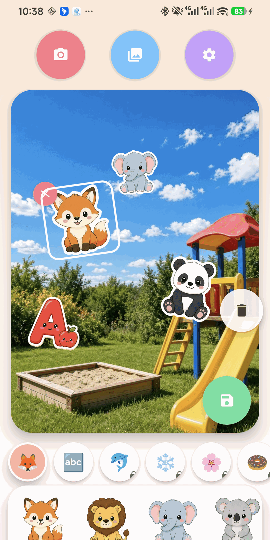 A playground photo decorated with a fox, an elephant, a panda, and a letter A sticker. The fox is selected.