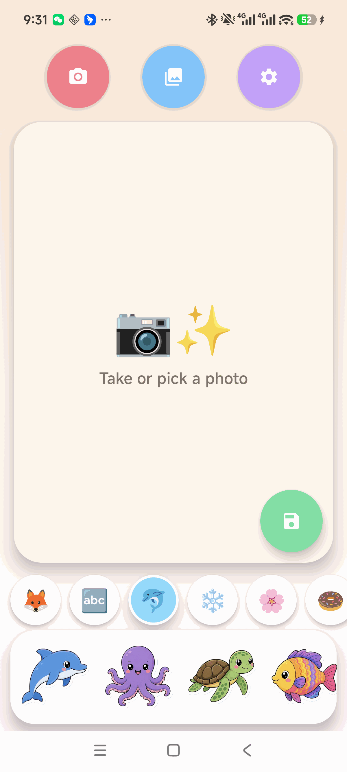 Stick 'n Snap home screen with camera, gallery, and settings buttons above an empty canvas and a row of ocean stickers.